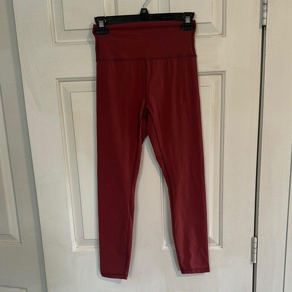 Zyia Active Rust colored leggings size 4 women’s